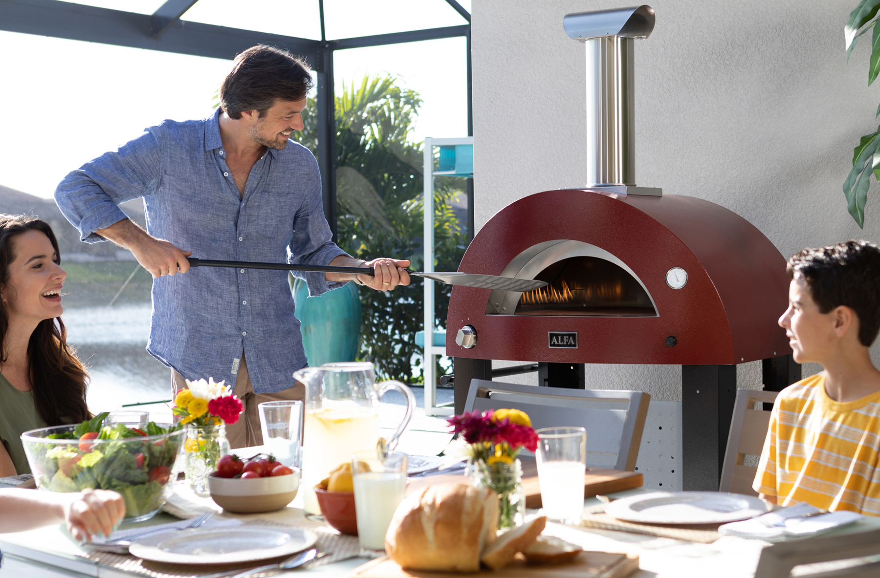 Chef preparing pizza in Alfa oven